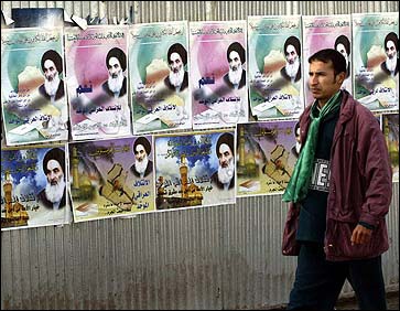  man walks past election posters with the image of prominent Iraqi Shiite cleric, Grand Ayatollah Ali al-Sistani, in Baghdad. A poll shows only 32 percent of Sunni Muslims are 'very likely' to vote in landmark national elections.(AFP/Sabah Arar) 