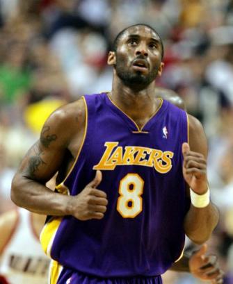 Los Angeles Lakers guard Kobe Bryant looks up at the scoreboard as he runs downcourt during the final seconds of the Lakers' game against the Portland Trail Blazers in Portland, Ore., Wednesday, April 20, 2005. The Lakers lost to the Trail Blazers 106-103. (AP