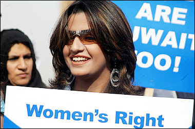 Kuwaiti women demonstrate in front of the parliament building in Kuwait City to demand their political rights, 07 March 2005. The government of Kuwait named two women to join its municipal council, in a historic move for the oil-rich Gulf emirate which only last month agreed to grant women full political rights.(AFP/File