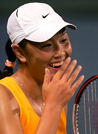 China's Shuai Peng reacts to a line call during her quarter-final match against Belgium's Kim Clijsters at the San Diego Classic in Carlsbad, California, August 5, 2005. Peng defeated Clijsters 6-4 6-4 to advance to the semi-finals.