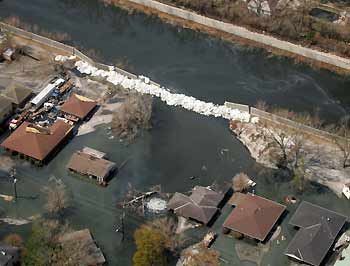 Large parts of New Orleans remain flooded two weeks after several levees failed in the wake of Hurricane Katrina September 14, 2005. The death toll from Hurricane Katrina climbed to 795 on Thursday after Louisiana officials raised the number of confirmed fatalities in that state to 558. [Reuters]