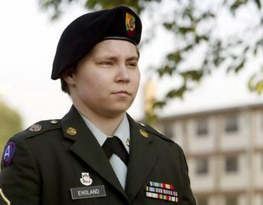 U.S. Army PFC Lynndie England walks into the courthouse for the start of her pre-trial hearing at Fort Hood, Texas in this September 20, 2005 file photo. 