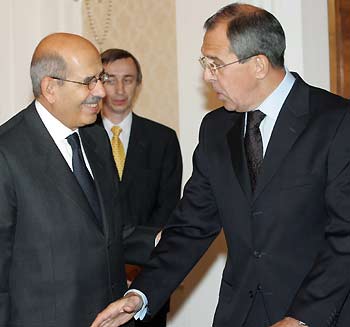 Russian Foreign Minister Sergei Lavrov (R) welcomes International Atomic Energy Agency (IAEA) head Mohamed ElBaradei in Moscow October 6, 2005. ElBaradei, in Moscow to attend a conference, on Wednesday said talks on Iran's nuclear programme, which the West fears is aimed at making atom bombs, could theoretically resume soon.