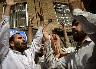 Iranian worshippers during a protest in support of Iran's Nuclear programme in front of the British embassy after Friday prayers ceremonies in Tehran October 7, 2005.