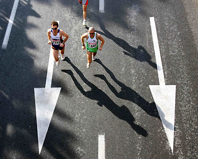 ompetitors run during the 10th Ljubljana's marathon in the Slovenian capital October 23, 2005. About 6,000 competitors from 23 countries participated in the marathon.