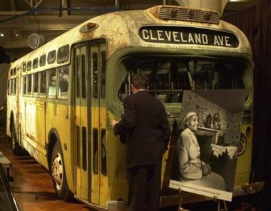 A visitor to the Henry Ford Museum looks inside the actual bus on which civil rights pioneer Rosa Parks refused to give up her seat to a white man in Montgomery, Ala. in 1955, Saturday, Dec. 1, 2001, at the museum in Dearborn, Mich.