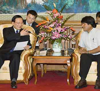 Bolivian President-elect Evo Morales (R) meets with China's State Councillor Tang Jiaxuan at the Diaoyutai State Guesthouse in Beijing January 8, 2006. 