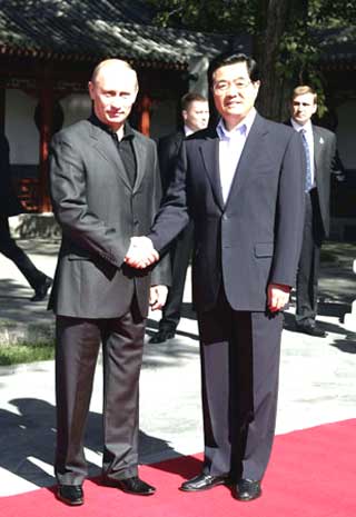 Hu Jintao meets with visiting Putin