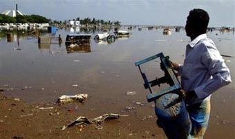 Asian tsunami kills 12,300, many more homeless