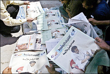 Sun prints Saddam photos, blasts critics