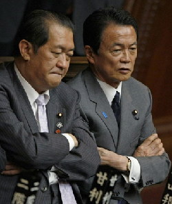 Japan minister quits, blow to PM before poll