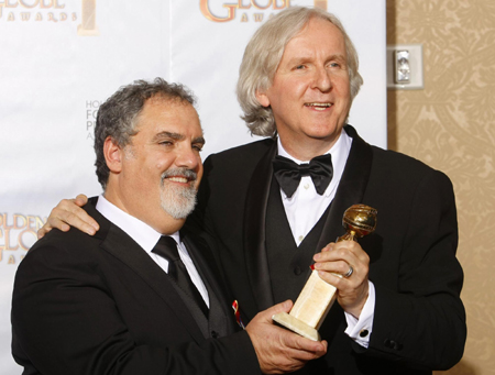 James Cameron poses with his award best motion picture for 