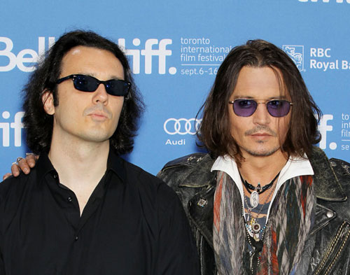 Depp shares 'ink' with Damien Echols