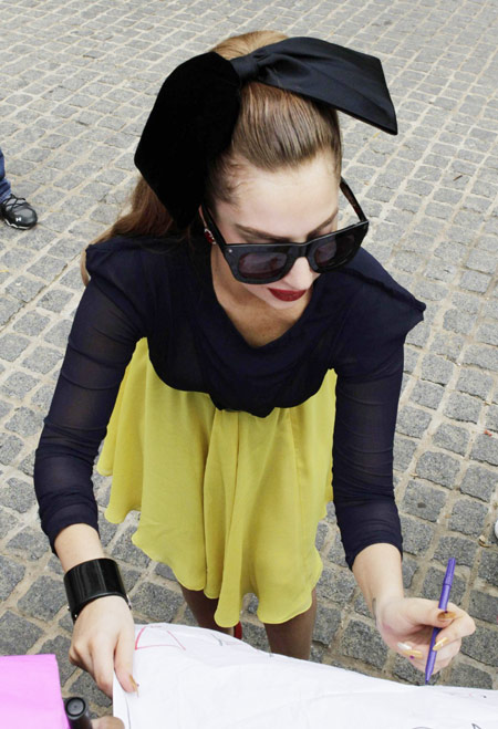 Lady Gaga signs autographs for fans