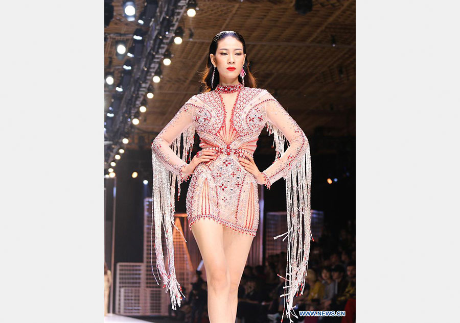 Models present creations at Vietnam Int'l Fashion Week