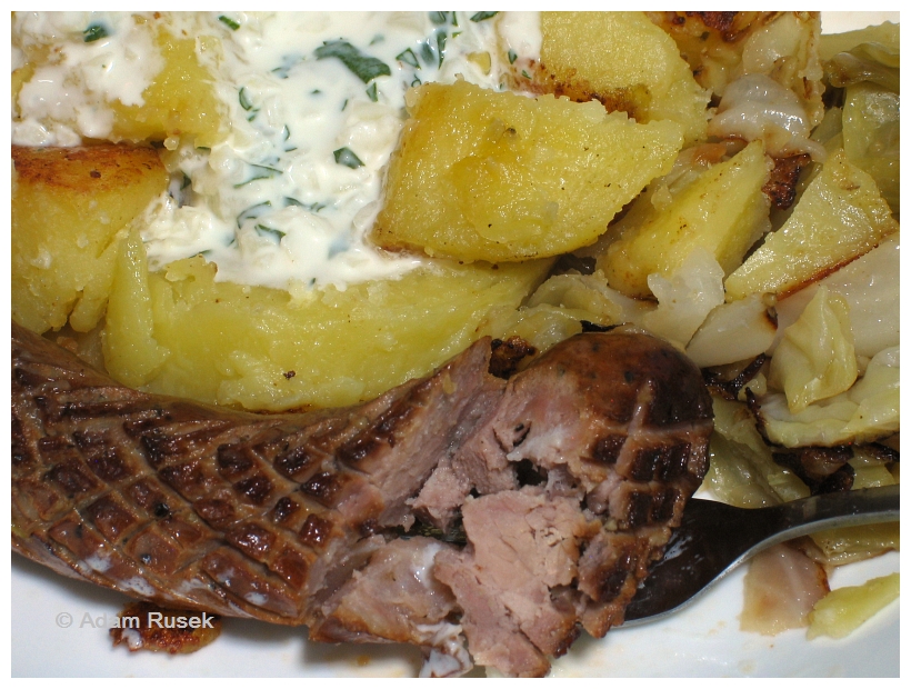 Fried Polish sausage with steamed potatoes and cabbage