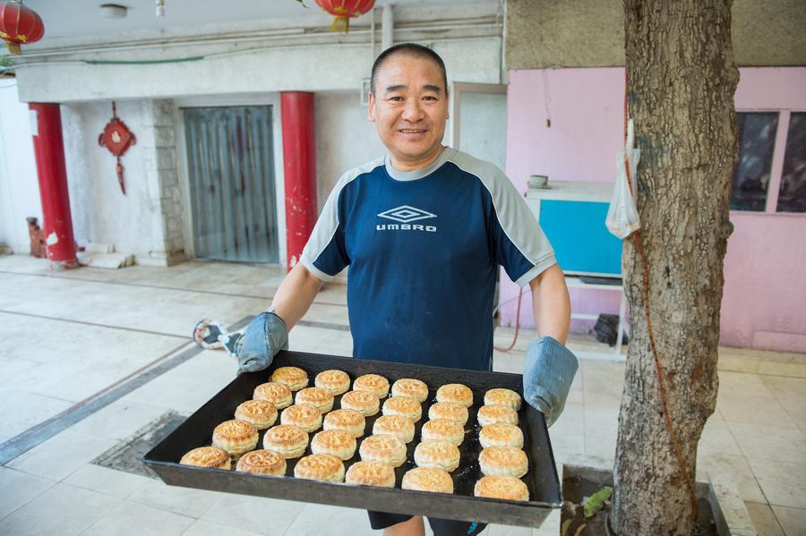 Pastry cooks make mooncakes in Cairo, Egypt