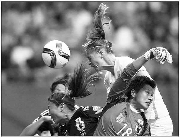 Japan keeps title defense alive