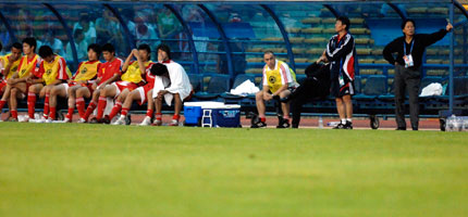 Chinese player Zhu Ting is seen after the team's 0-3 defeat to Uzbekistan during their 2007 AFC Asian Cup Group C soccer match in Shah Alam outside Kuala Lumpur July 18, 2007.