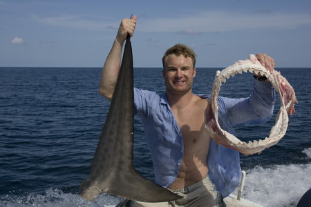 Diver grapples with 12ft tiger shark to save friend