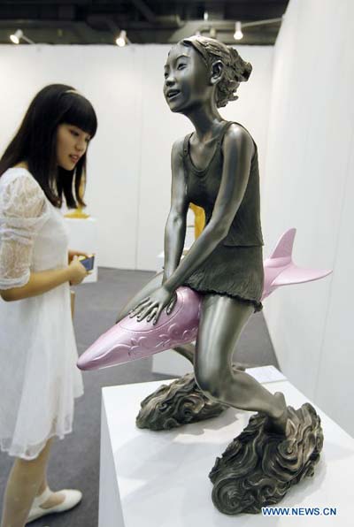 Creative statues displayed at Beijing Art Expo