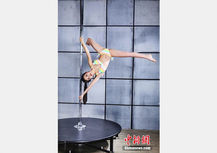 Contestants perform at China pole dance contest