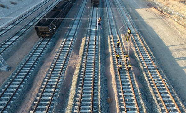 Railway workers undertake maintenance in Baotou