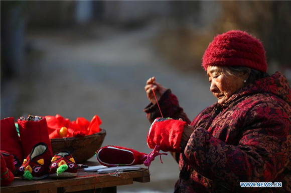 Shoemaker, 85, sews ‘tiger’ wish for children