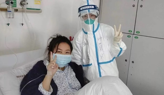 Jiading medics help cure two patients in Wuhan