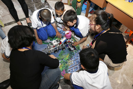 Children participate in robotic competition