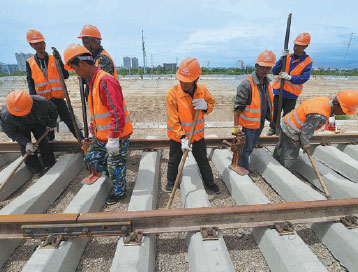 First rails laid for Xinjiang's third link to outside