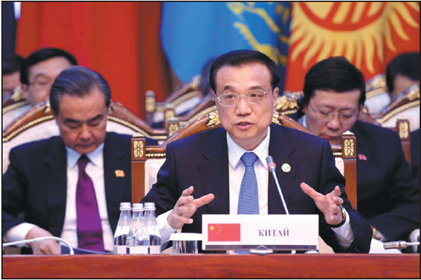 Li promotes SCO bank, free trade