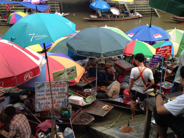 Bangkok's stalls show development fruits yet to be shared by all