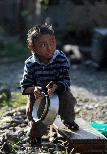 Nepal teen stands tall as world's shortest man