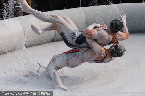 Mud wrestling contest in Hainan