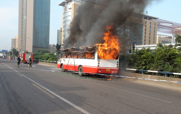 Bus engulfed in flames after refueling in SW China