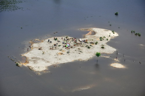 Marooned family mergered in floods in Pakistan