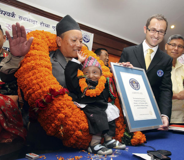 Nepal teen stands tall as world's shortest man