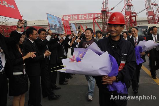 Chinese rescuer returns from Chile