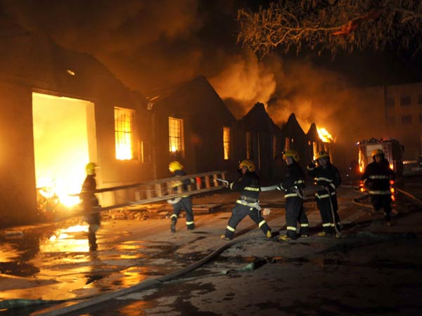 Fire engulfs work depot in NW China