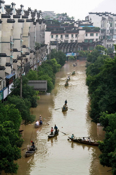 Residents evacuate amid worst floods in 56 yrs