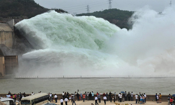 Flood discharge a dramatic scene at reservoir