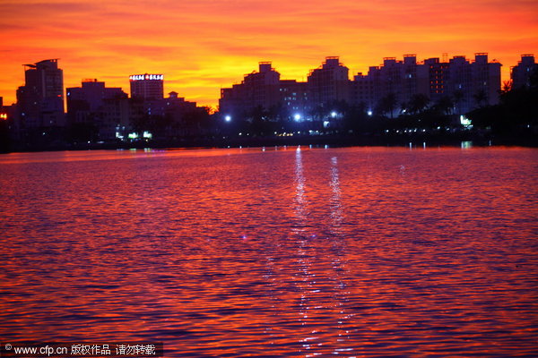 Fiery skies warn of looming tropical storm