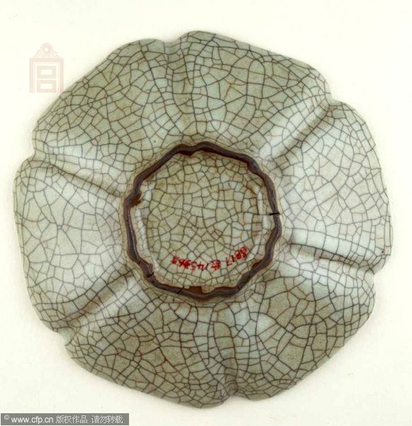 Photos of damaged ancient plate raise doubts