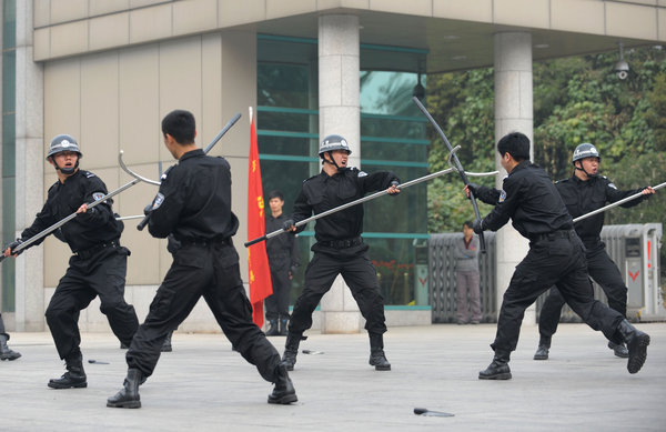 Beijing bailiffs show off new defense skills