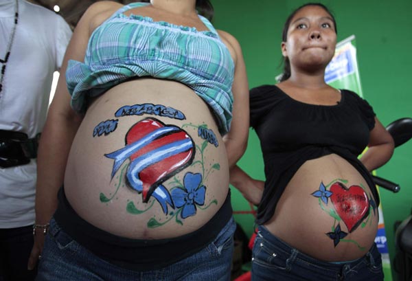 Mothers-to-be show off painted bellies