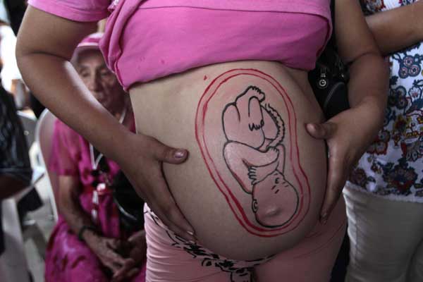 Mothers-to-be show off painted bellies