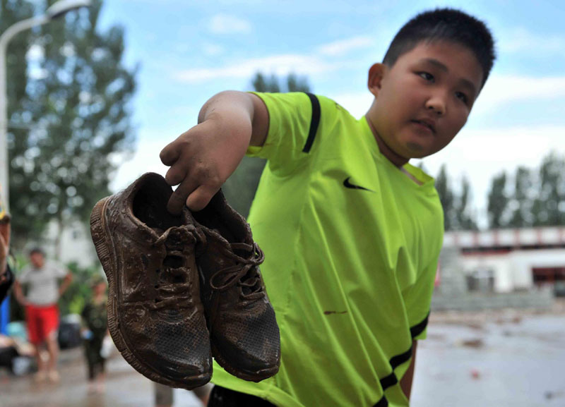 Heavy rain lashes Beijing