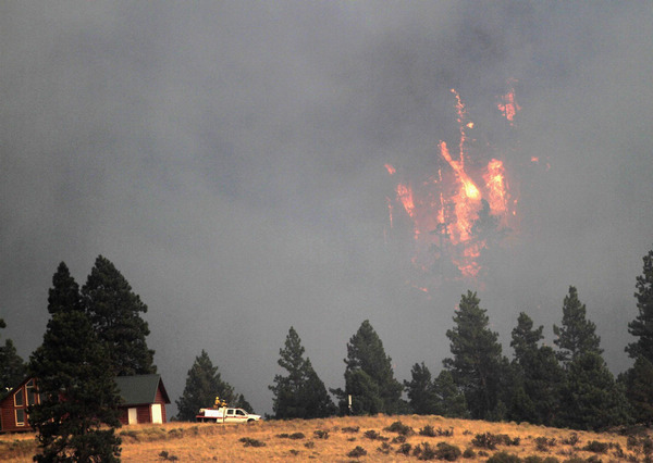 Wildfires blaze across US west