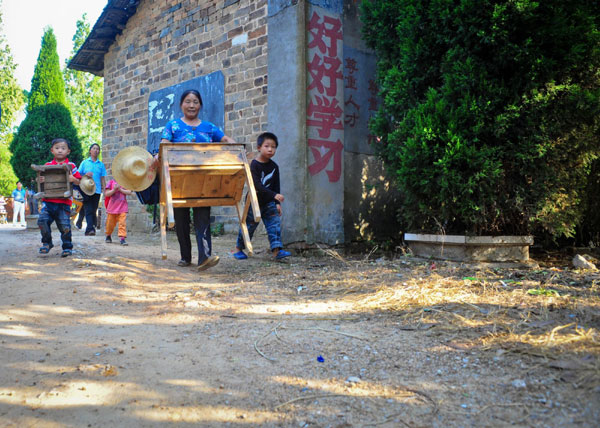 A desk for every student in C China